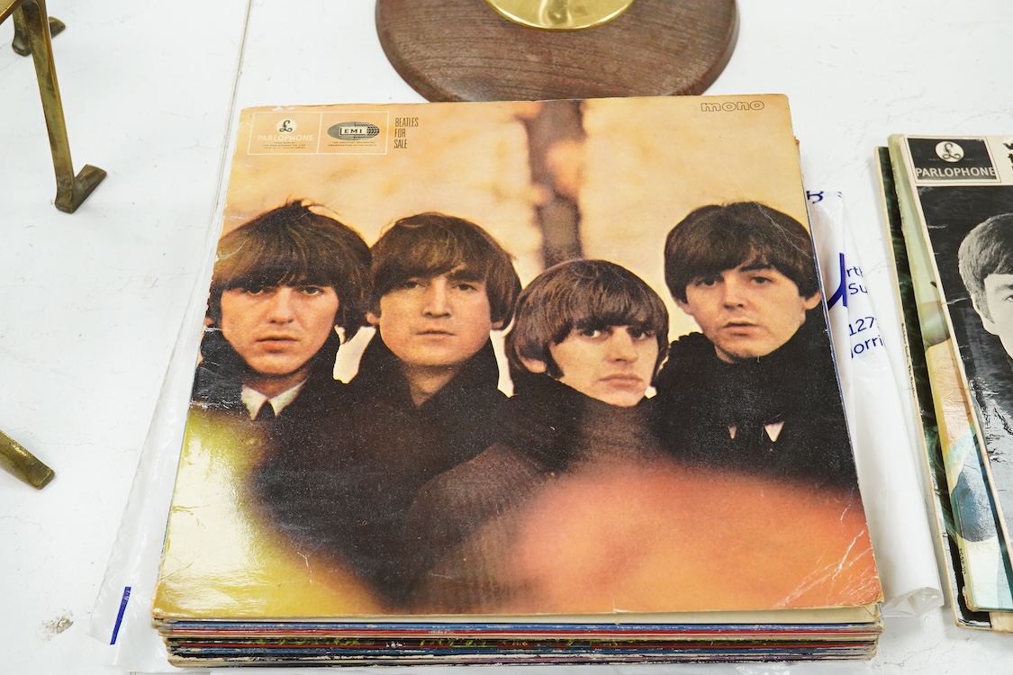 Fourteen The Beatles related LP record albums, including; Rubber Soul, The Beatles at the Hollywood Bowl, With The Beatles, Beatles For Sale, Sgt. Pepper, Revolver, McCartney II, Wings Over America, the Concert for Bangl